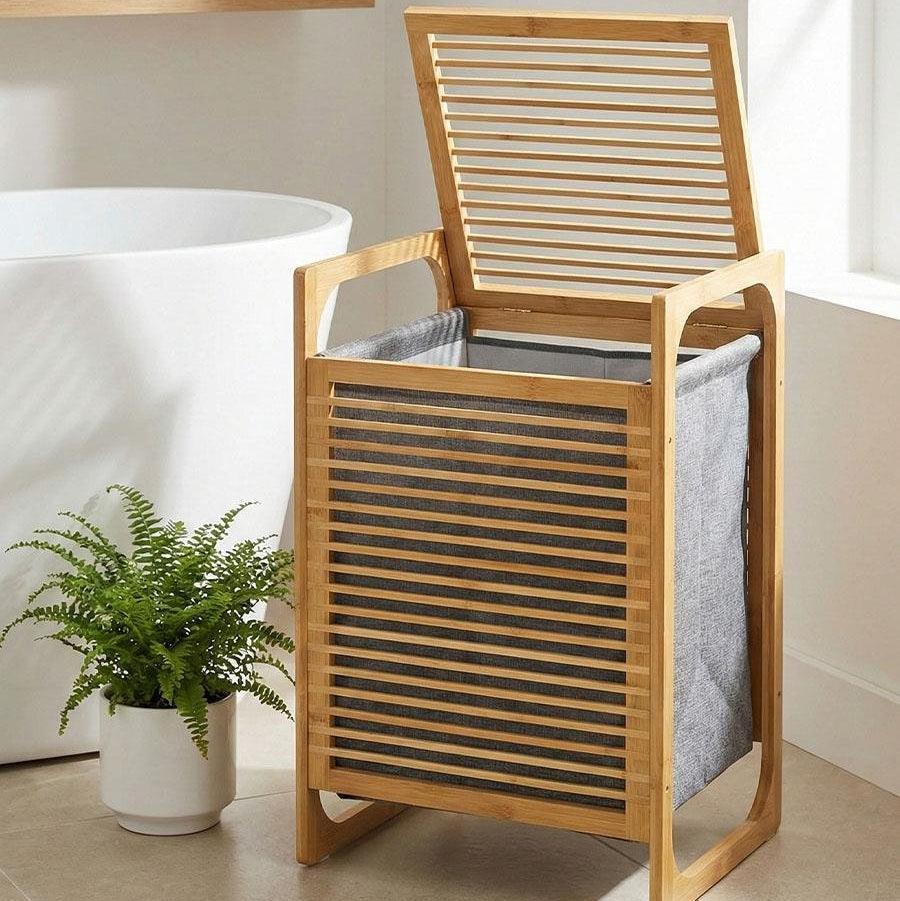 Panier à linge en bambou avec couvercle et sac gris, idéal pour salle de bain ou chambre