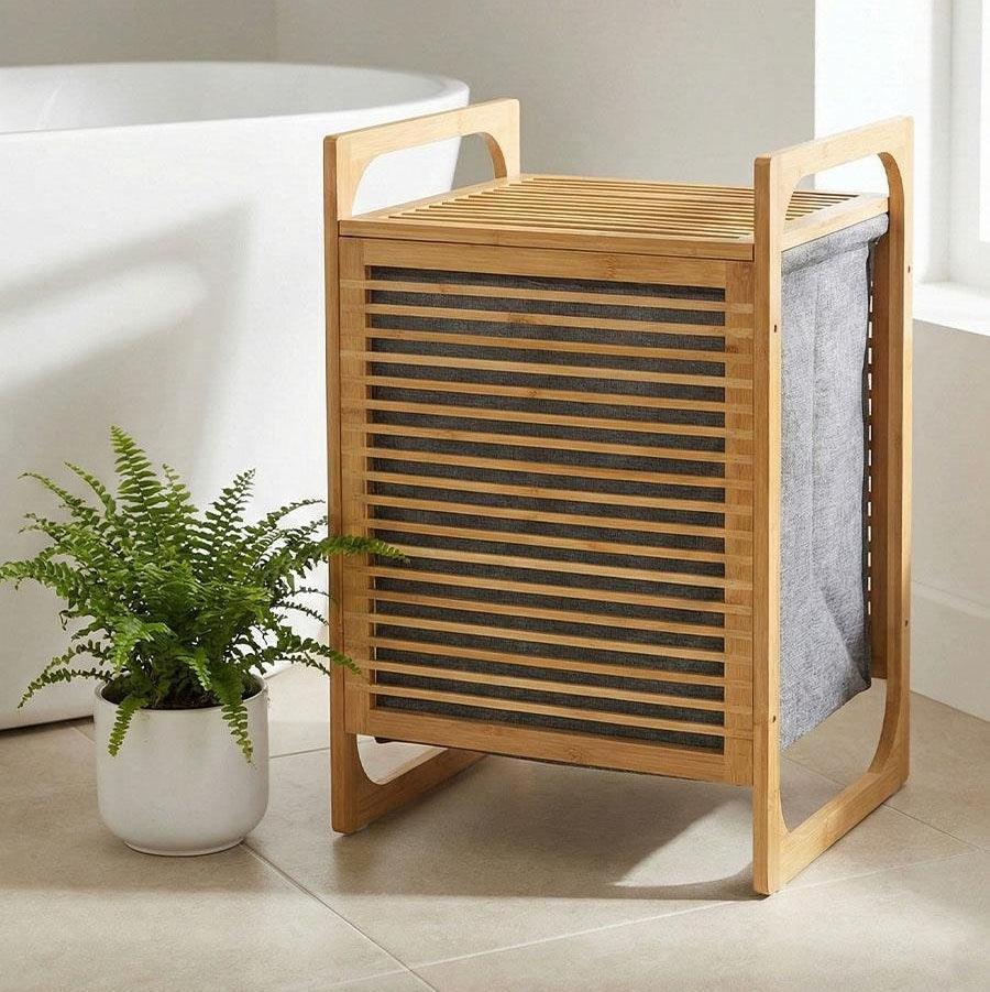Panier à linge en bambou avec sac gris, idéal pour salle de bain moderne
